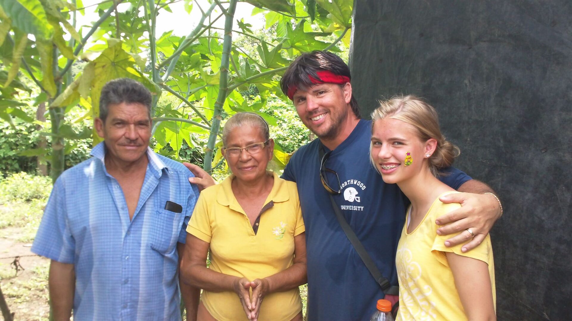 A group of people standing next to each other.